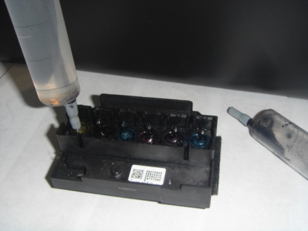 Прочистка печатающей головки Epson